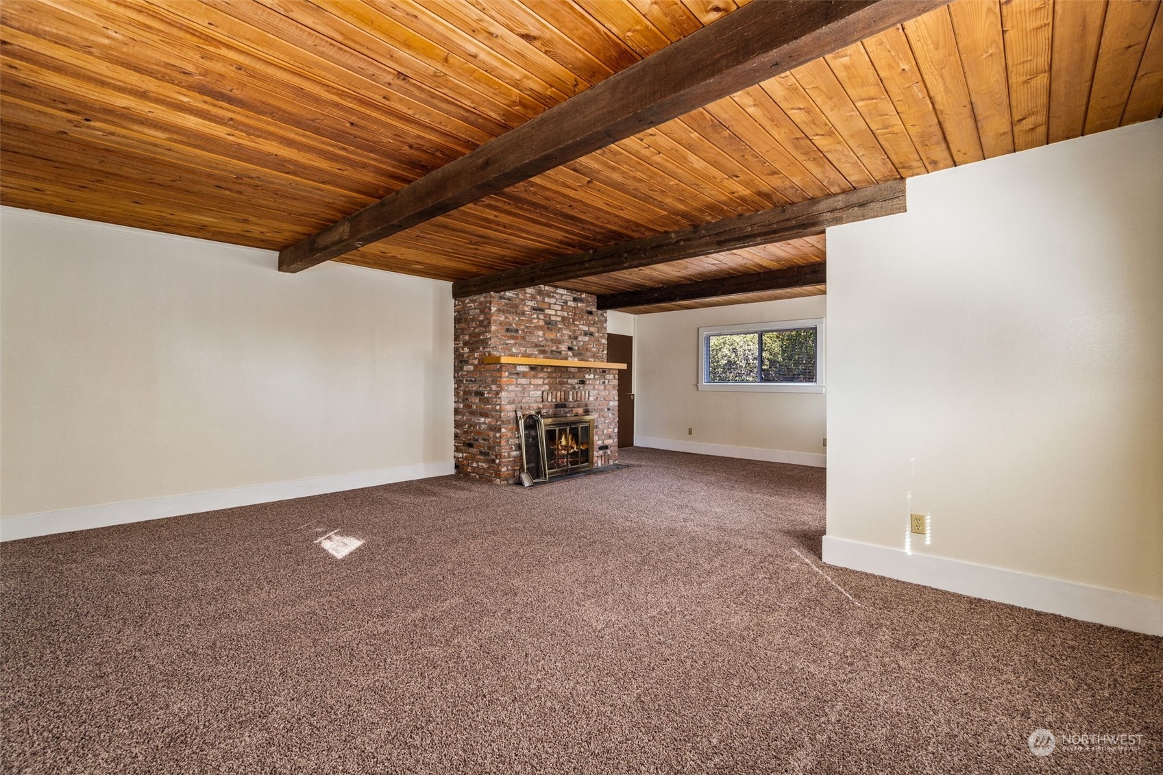 18127 Case Road Southwest Rochester, WA 98579 - Photo 6 of 37 a view of empty room with a fireplace
