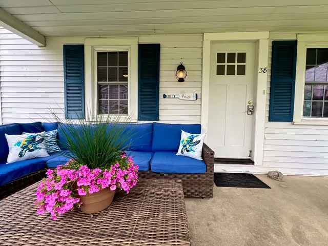 a view of a porch with furniture