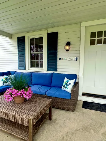 a view of a livingroom with furniture