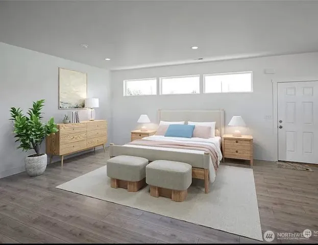 a living room with furniture and view of living room