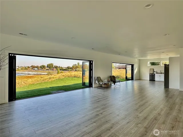 a view of swimming pool with an outdoor space and seating area