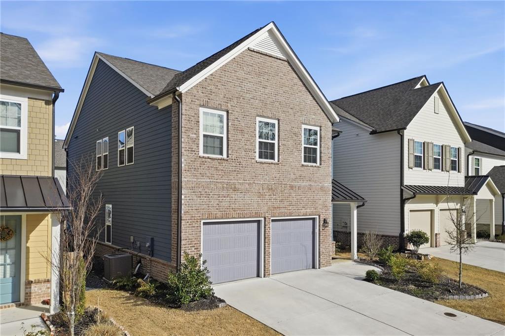 a front view of a house with yard