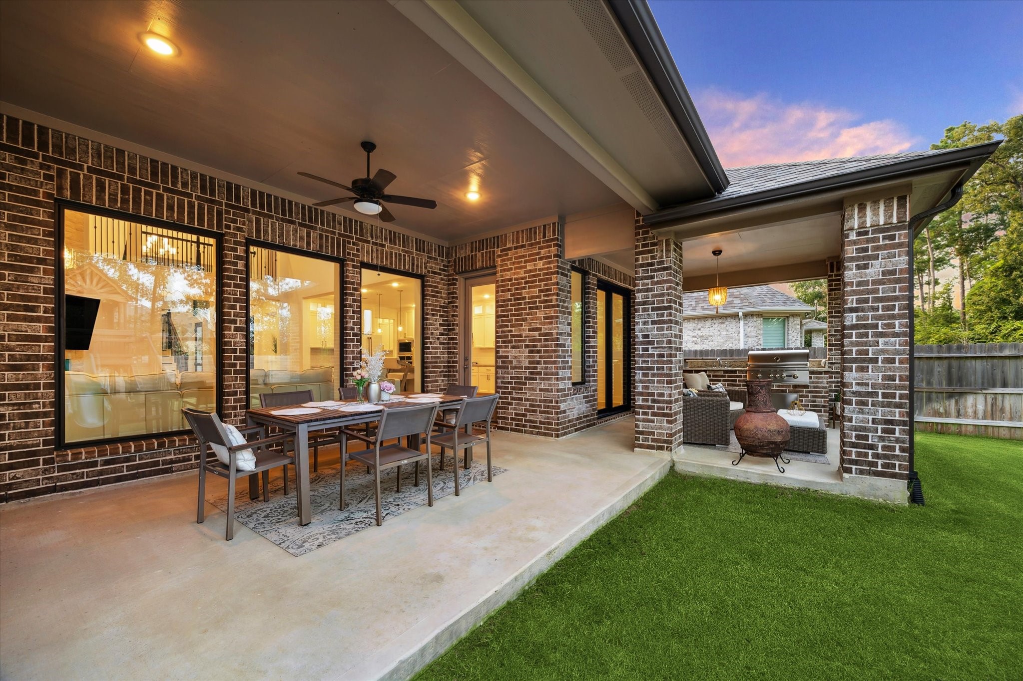17355 Camillia Trail Conroe, TX 77302 - Photo 27 of 34 a view of an outdoor dining space with furniture and garden