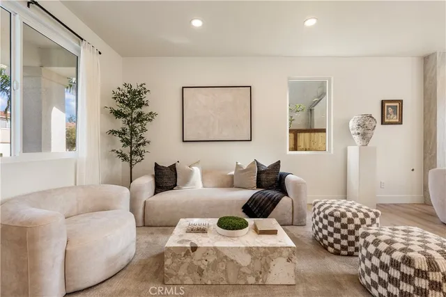 a living room with furniture and window