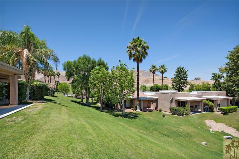72384 Ridgecrest Lane Palm Desert, CA 92260 - Photo 2 of 23 a view of a house with a garden