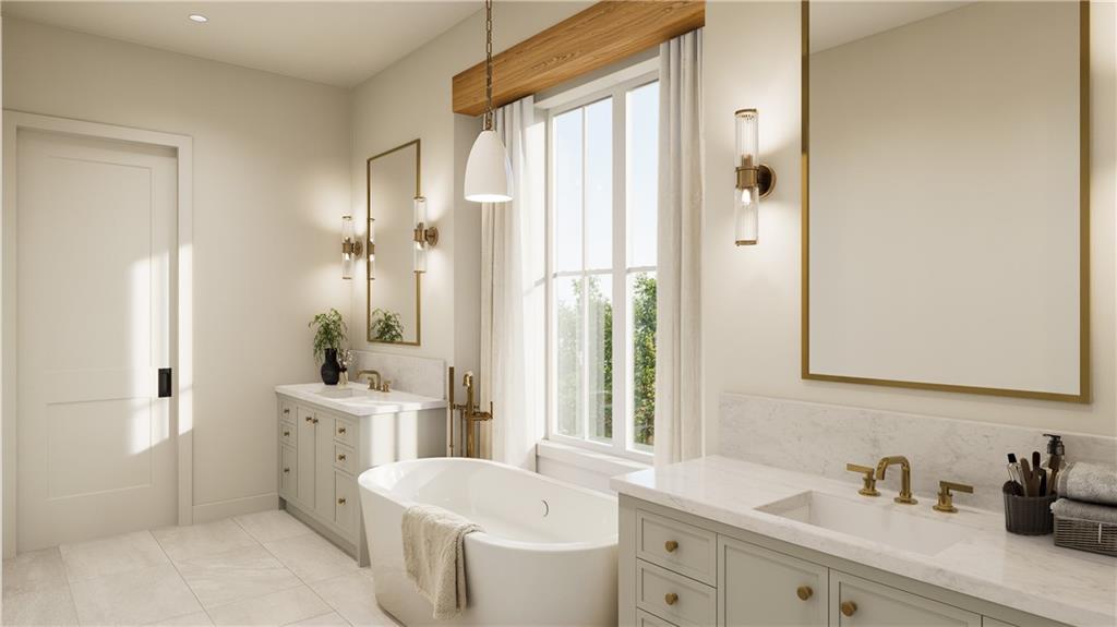 8450 Forsyth Commons Cumming, GA 30041 - Photo 5 of 11 a bathroom with a sink a toilet and a mirror