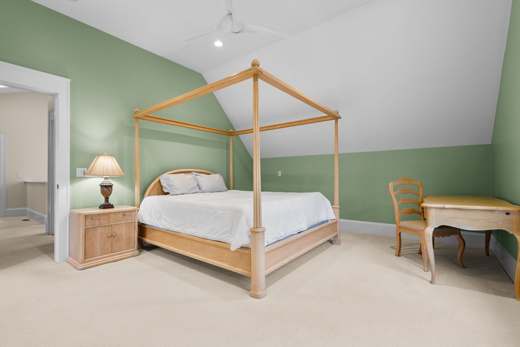 32 Standish Circle Wellesley, MA 02481 - Photo 11 of 29 a bedroom with a bed and a table