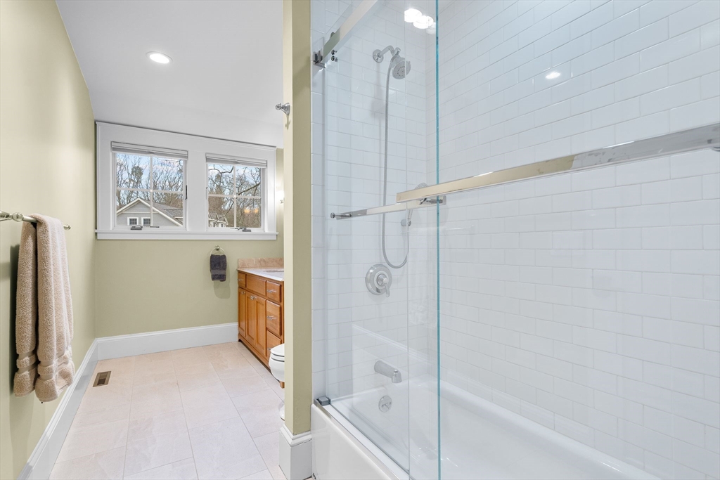 32 Standish Circle Wellesley, MA 02481 - Photo 14 of 29 a bathroom with a bathtub and a shower