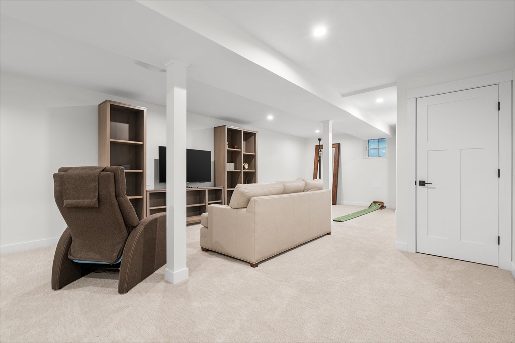 32 Standish Circle Wellesley, MA 02481 - Photo 19 of 29 a living room with furniture and large window