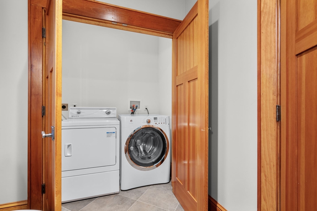 32 Standish Circle Wellesley, MA 02481 - Photo 20 of 29 a utility room with dryer and washer