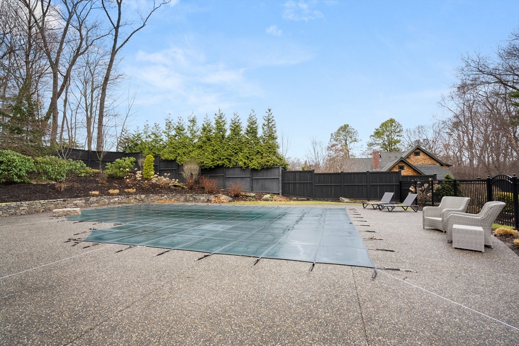 32 Standish Circle Wellesley, MA 02481 - Photo 22 of 29 a view of backyard with plants and trees