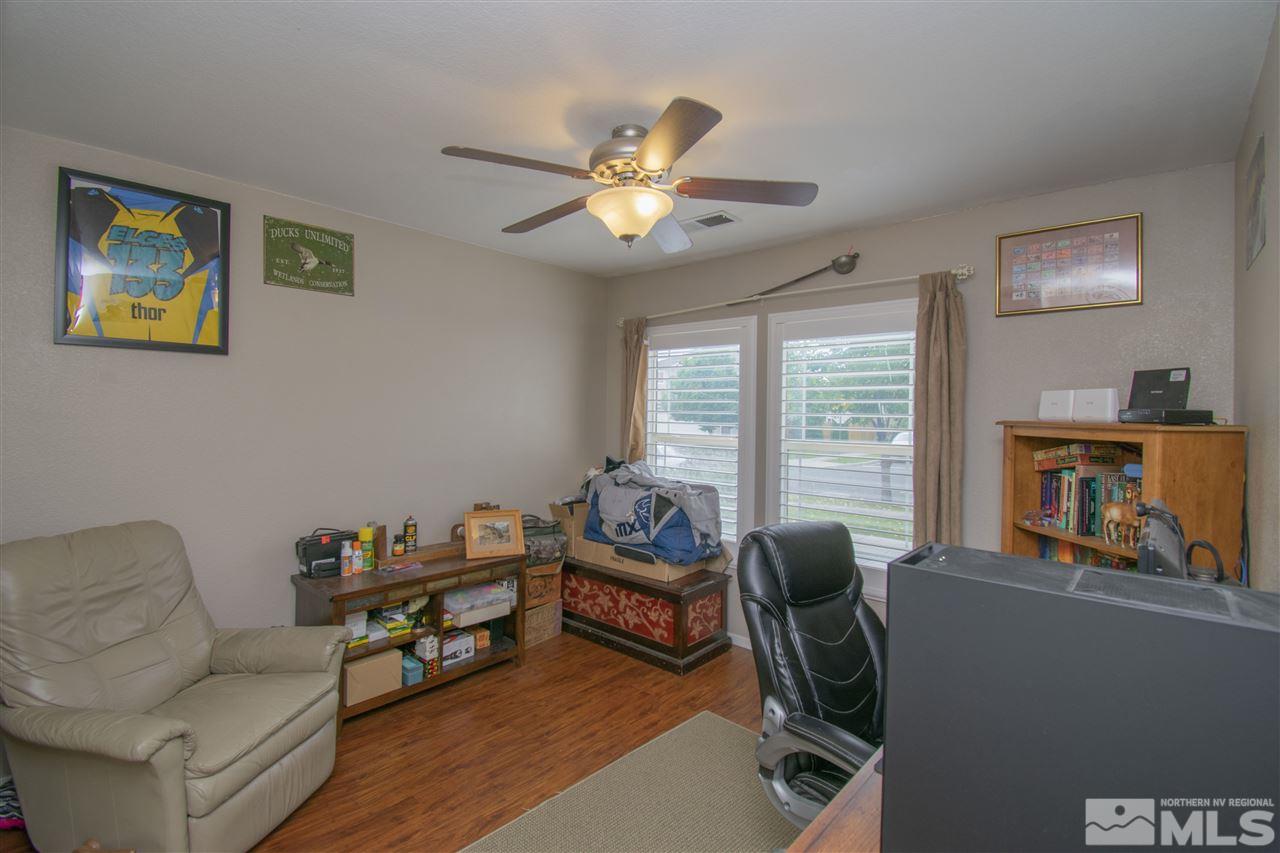 7749 Welsh Drive Reno, NV 89506 - Photo 14 of 25 a living room with furniture and a window