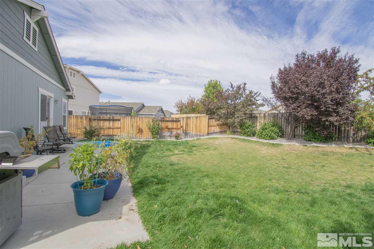 7749 Welsh Drive Reno, NV 89506 - Photo 18 of 25 a view of a backyard with sitting area