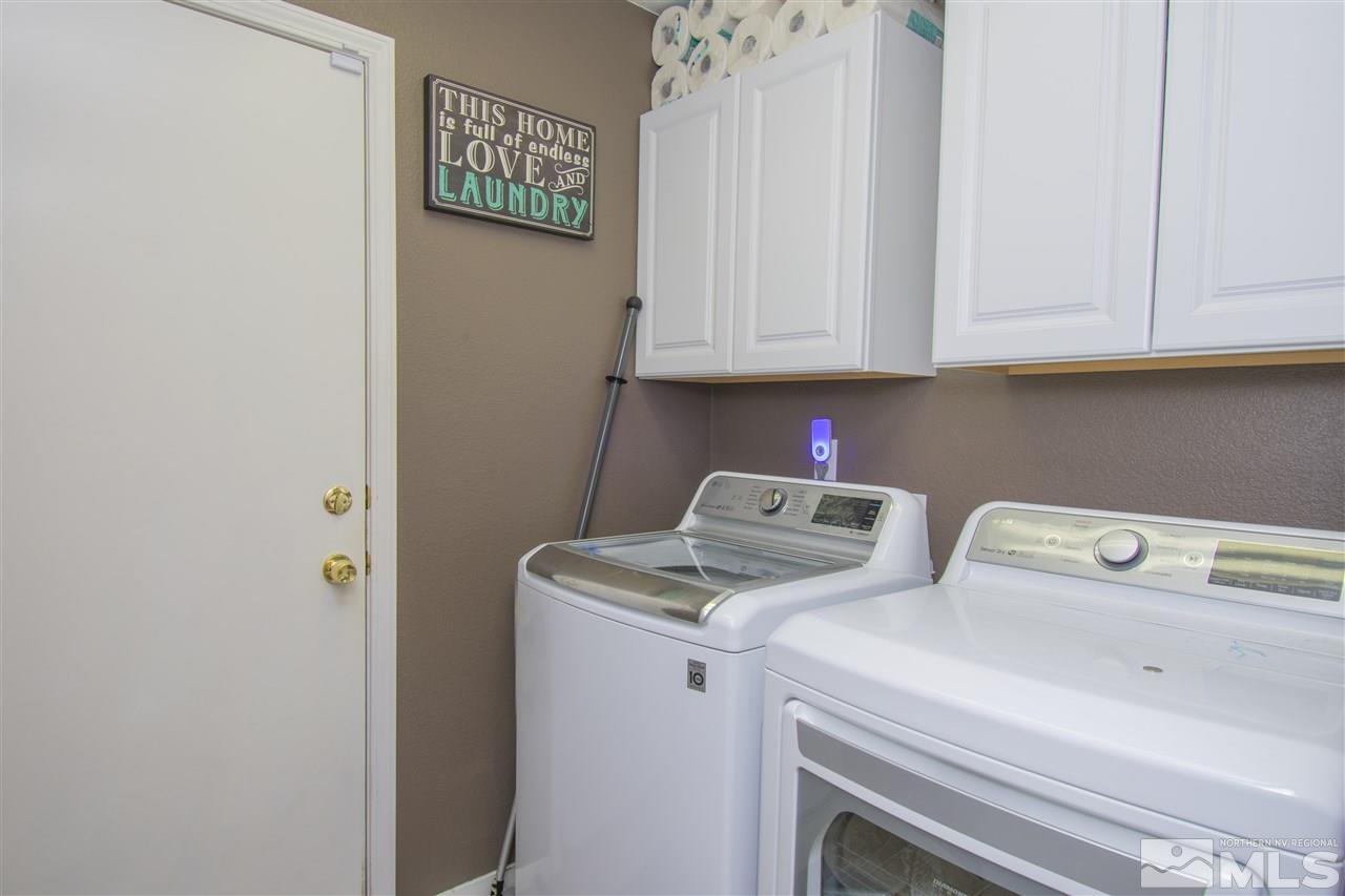 7749 Welsh Drive Reno, NV 89506 - Photo 10 of 25 a utility room with dryer and washer