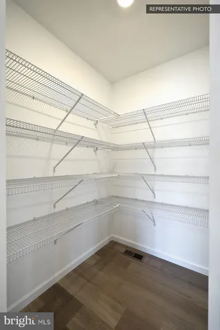 a view of an empty walk in closet