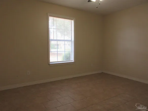 an empty room with a bathroom
