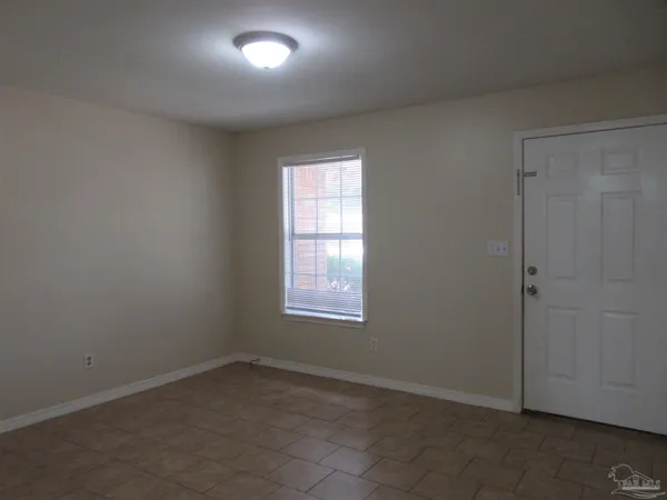 an empty room with a window