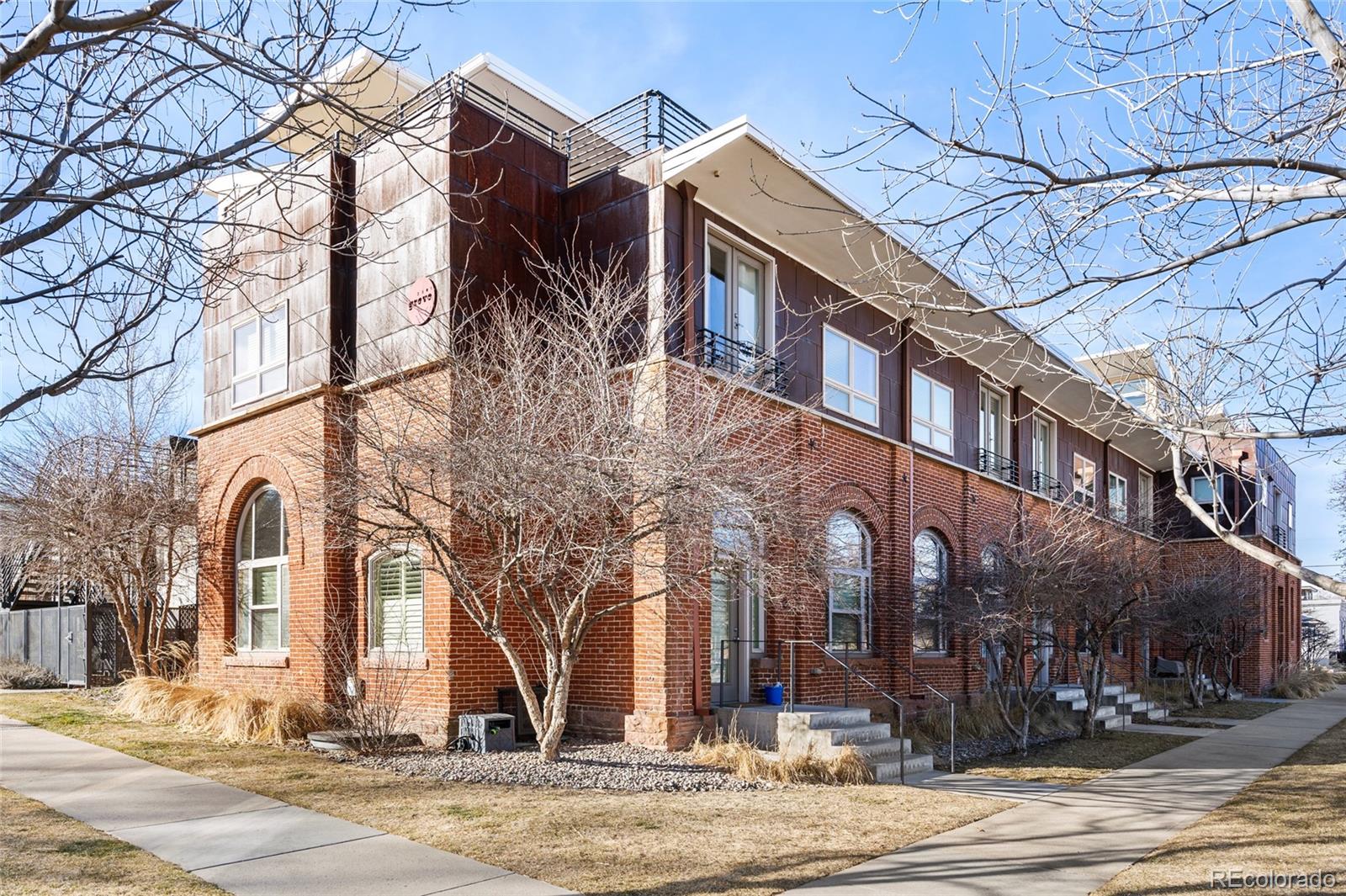 2501 Grove Street, Unit 101 Denver, CO 80211 - Photo 35 of 37 a view of a building with a street