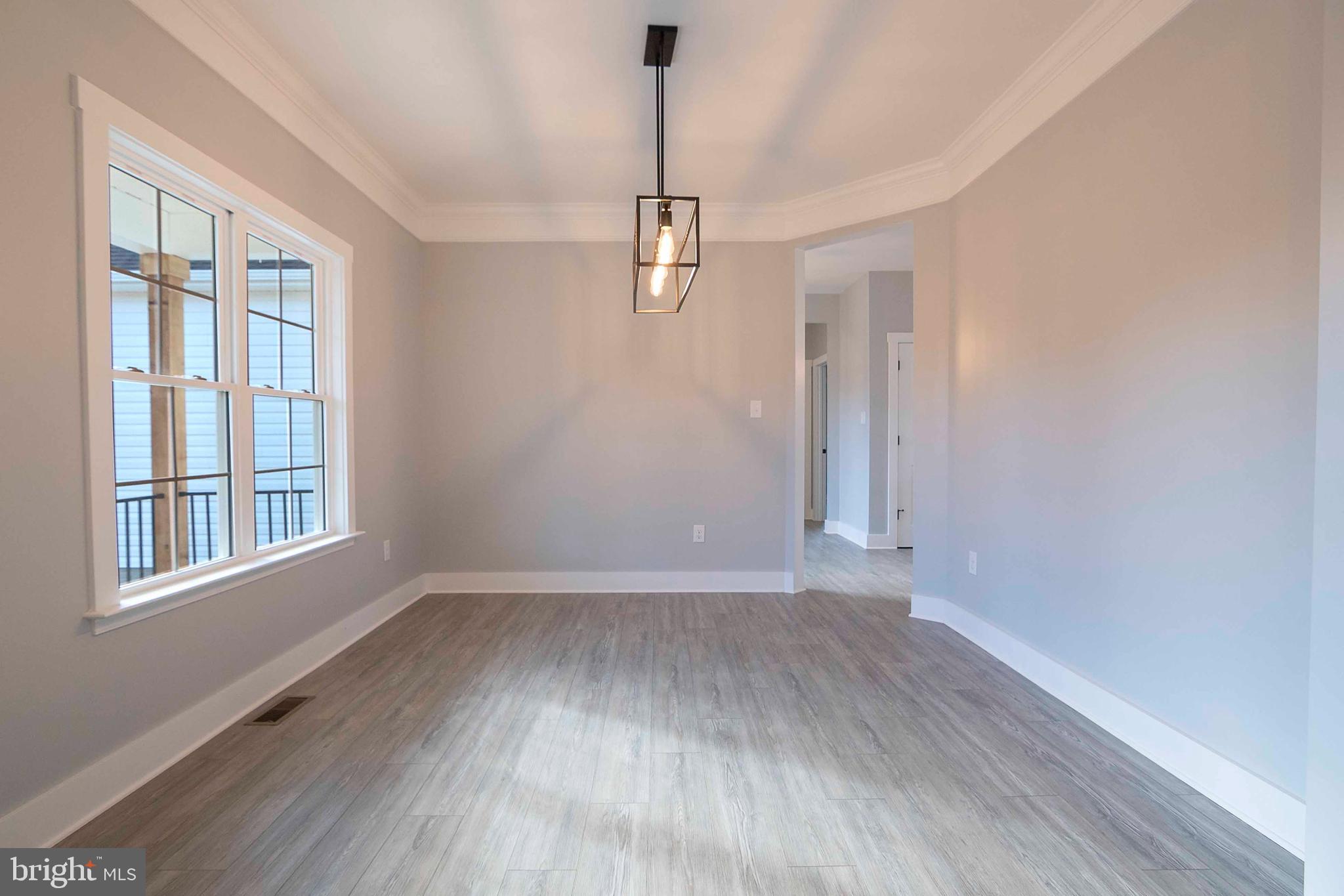 1633 Catlett Mountain Road Front Royal, VA 22630 - Photo 32 of 69 wooden floor in an empty room with a window