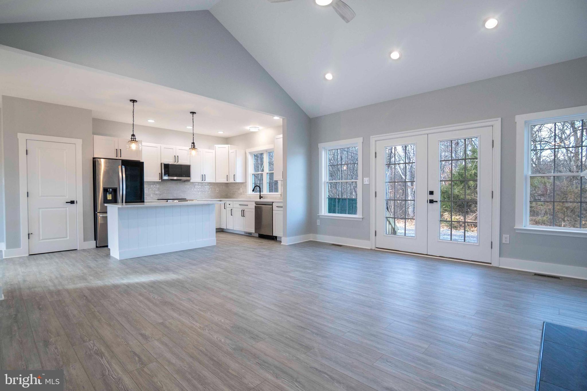 1633 Catlett Mountain Road Front Royal, VA 22630 - Photo 33 of 69 a view of a kitchen with wooden floor and a kitchen