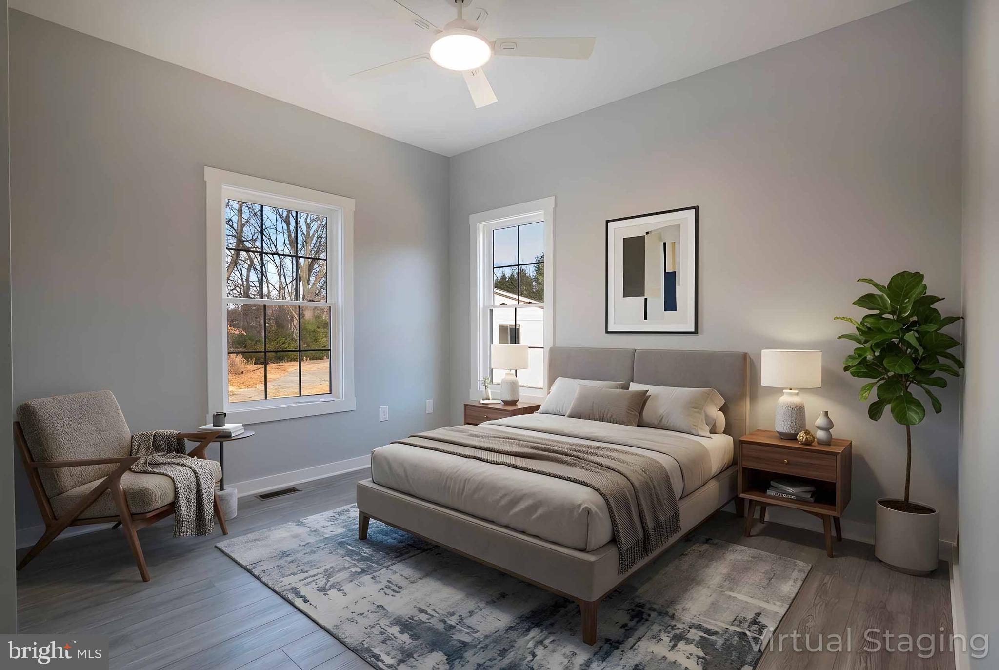 1633 Catlett Mountain Road Front Royal, VA 22630 - Photo 36 of 69 a bedroom with a bed and a chair