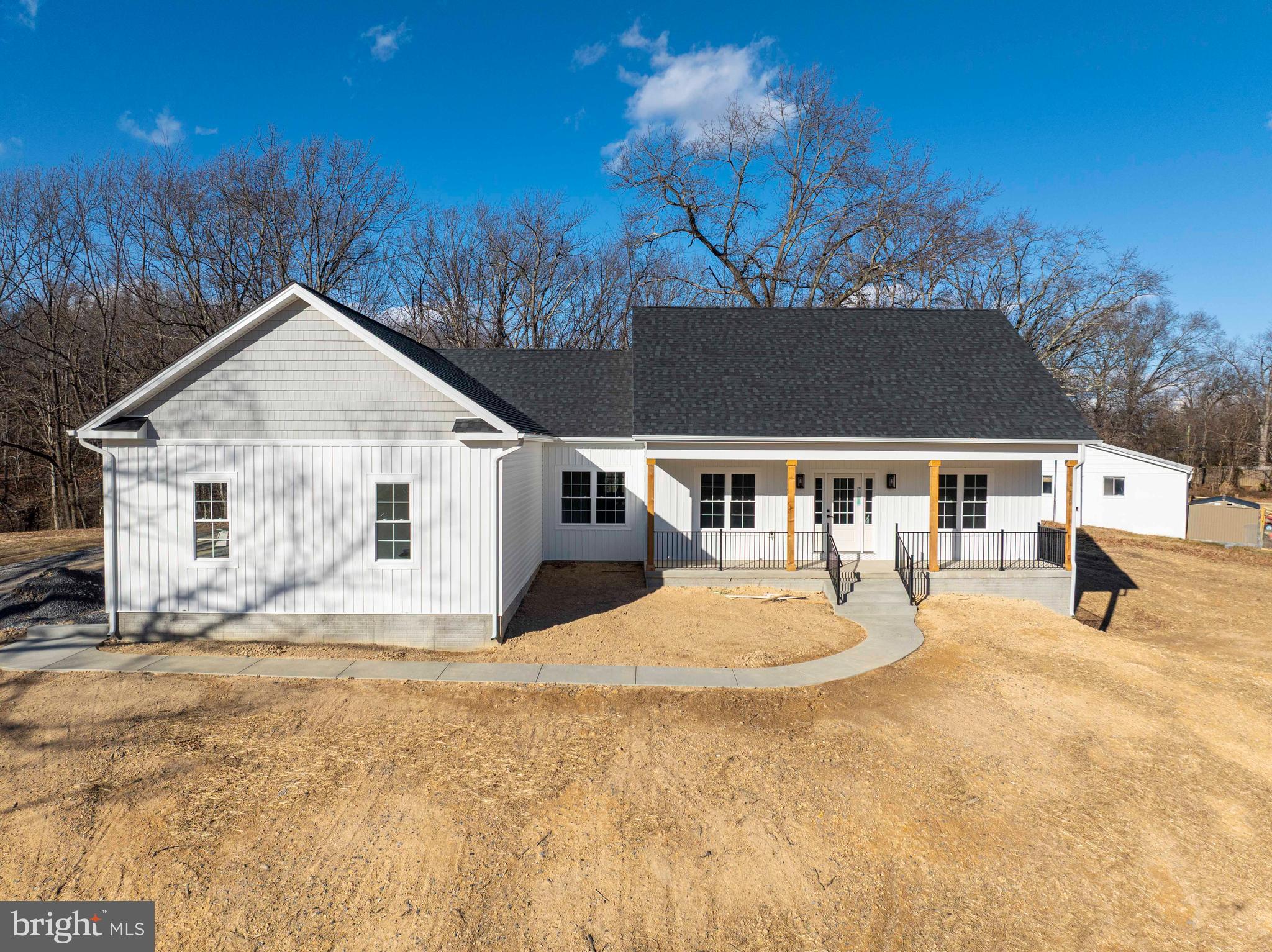 1633 Catlett Mountain Road Front Royal, VA 22630 - Photo 4 of 69 a front view of a house with a yard