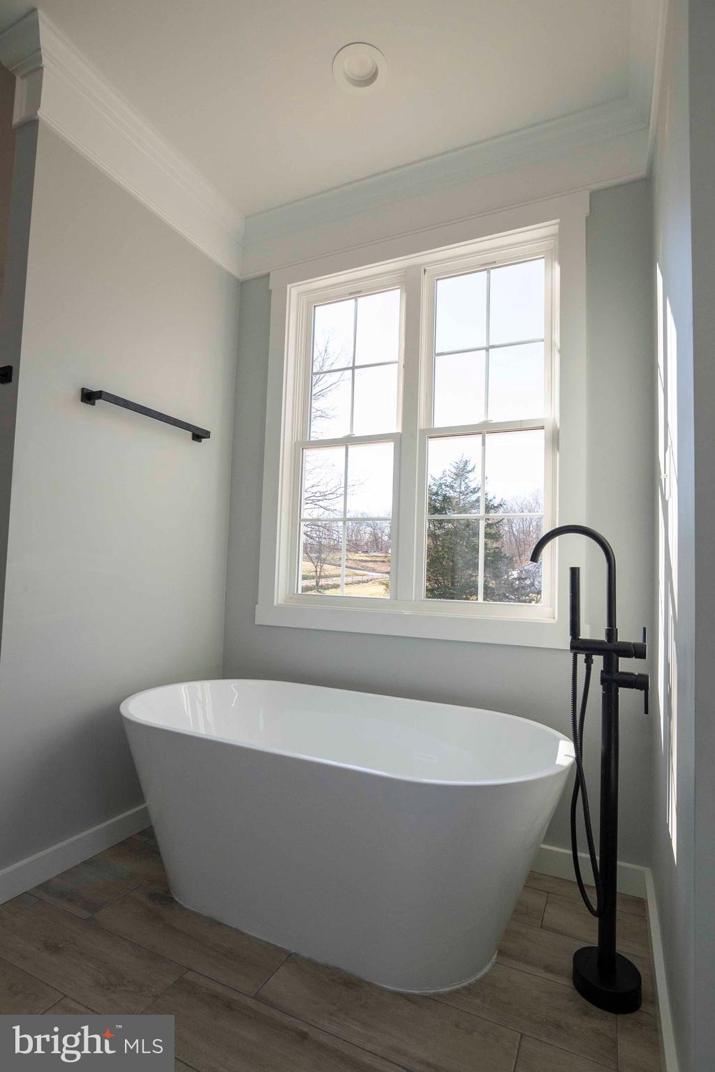 1633 Catlett Mountain Road Front Royal, VA 22630 - Photo 48 of 69 a white bath tub sitting in a bathroom