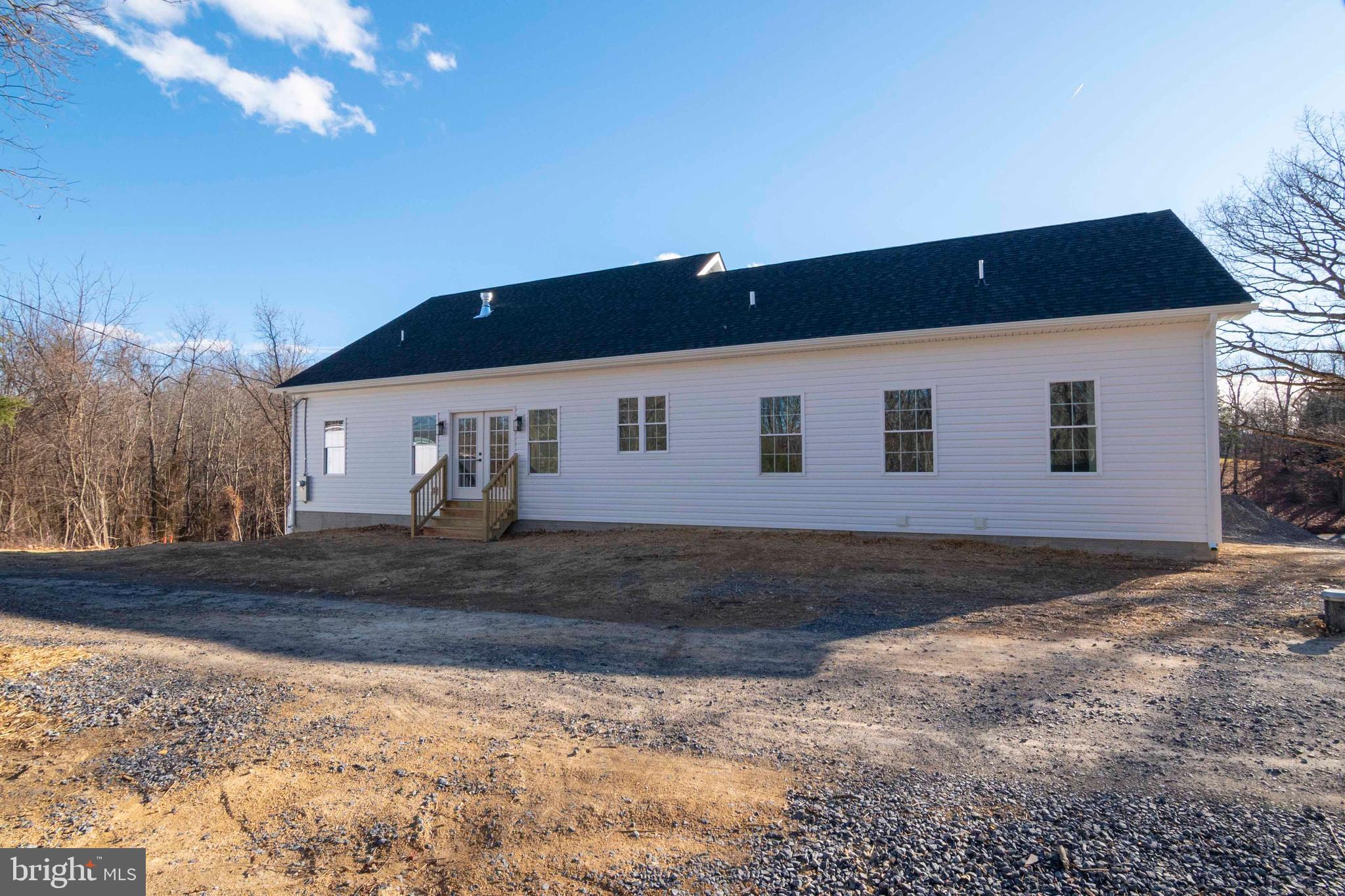 1633 Catlett Mountain Road Front Royal, VA 22630 - Photo 62 of 69 a house view with a backyard