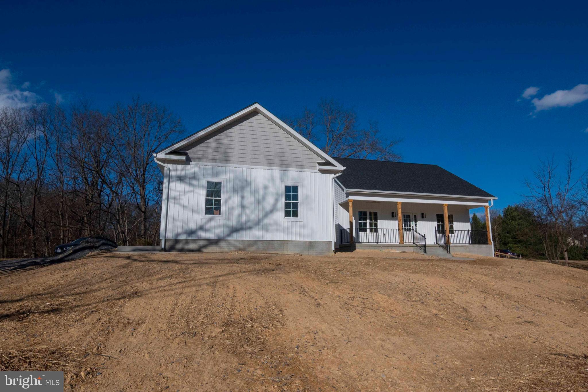 1633 Catlett Mountain Road Front Royal, VA 22630 - Photo 68 of 69 a front view of a house with a yard