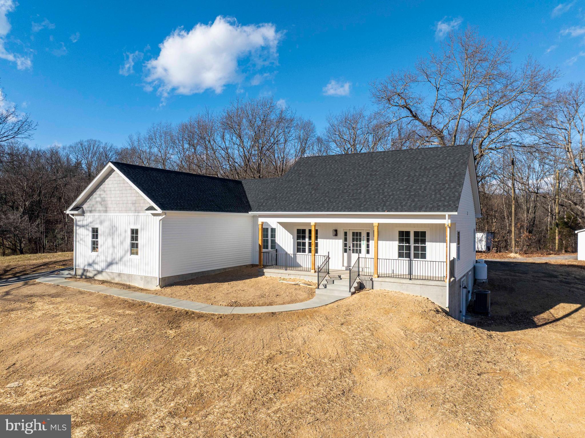 1633 Catlett Mountain Road Front Royal, VA 22630 - Photo 7 of 69 a view of a house with a yard
