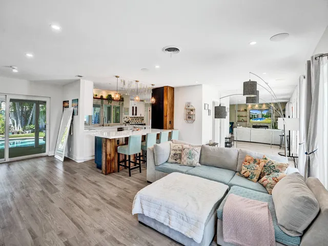 a outdoor space with patio lots of furniture and garden view