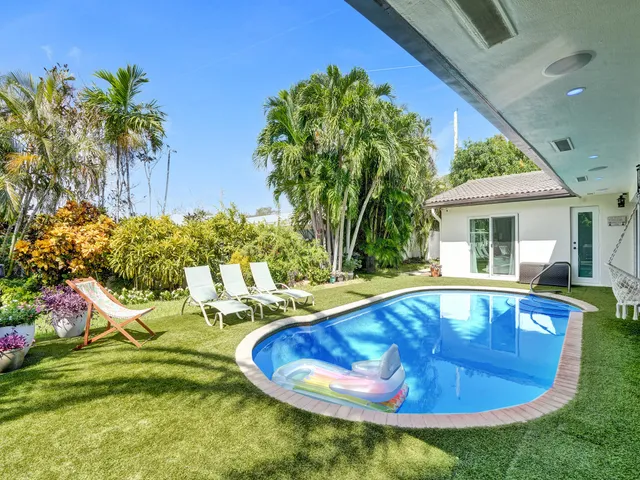 a bedroom with bed and window