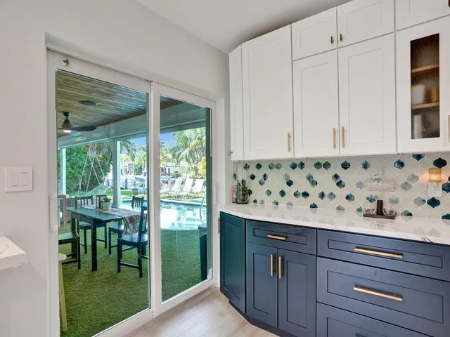 a bathroom with a shower a toilet and a window