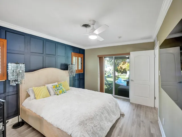 a bathroom with a double vanity sink mirror and shower