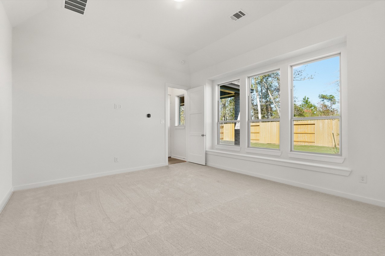 13039 Wandering Rdg Lane Conroe, TX 77302 - Photo 12 of 25 Primary Bedroom