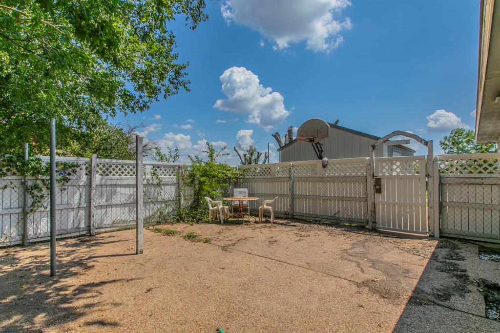 1936 Post Oak Drive Waco, TX 76705 - Photo 26 of 33 View of yard featuring a gate
