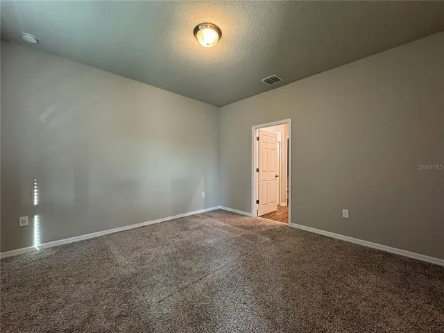 an empty room with an entryway