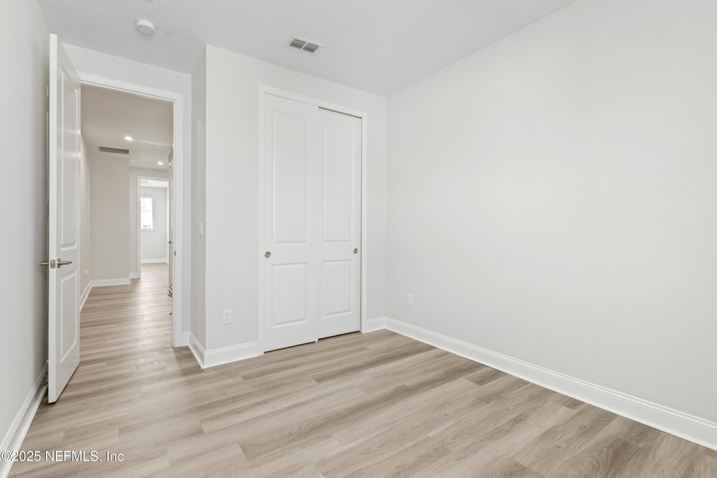 3524 Oystercatcher Way Jacksonville, FL 32224 - Photo 23 of 40 wooden floor in an empty room