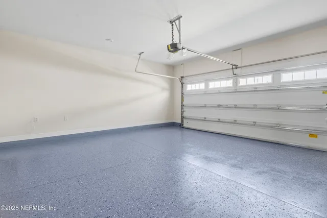 a view of a lake with houses in the back