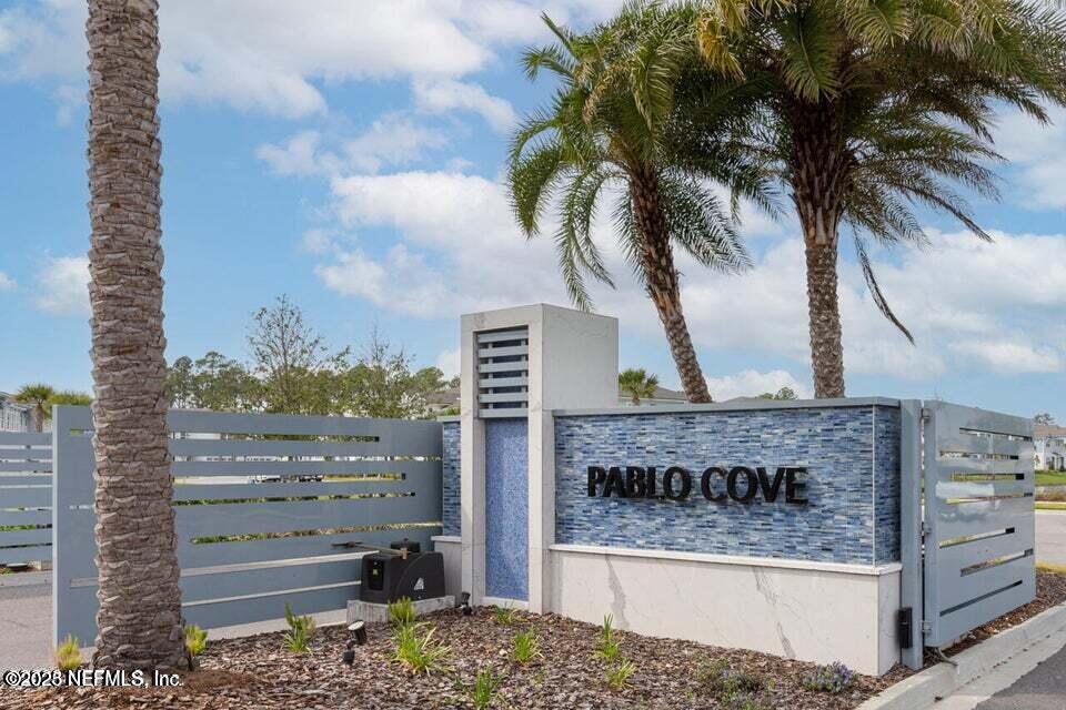 3524 Oystercatcher Way Jacksonville, FL 32224 - Photo 37 of 40 a view of a yard and a garage