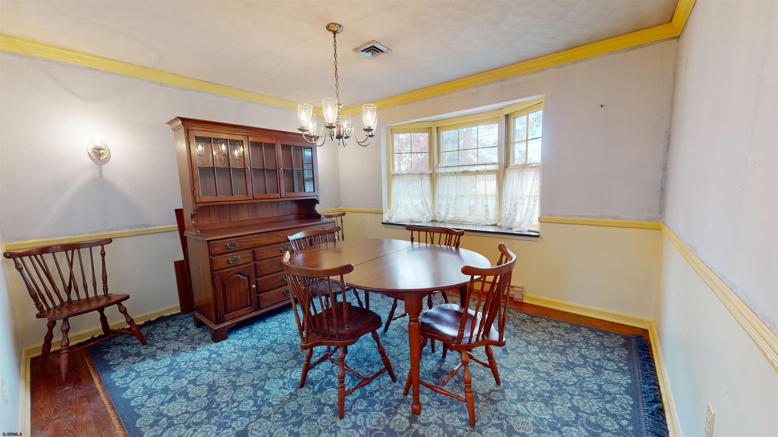 508 Lehigh Road South Glassboro, NJ 08028 - Photo 13 of 24 a view of a dining room with furniture window and wooden floor