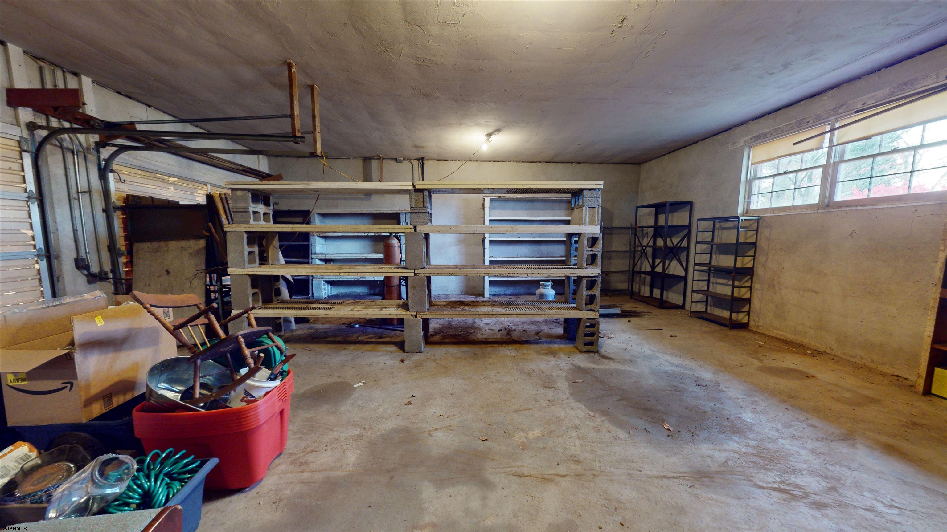 508 Lehigh Road South Glassboro, NJ 08028 - Photo 14 of 24 a view of a storage area with racks