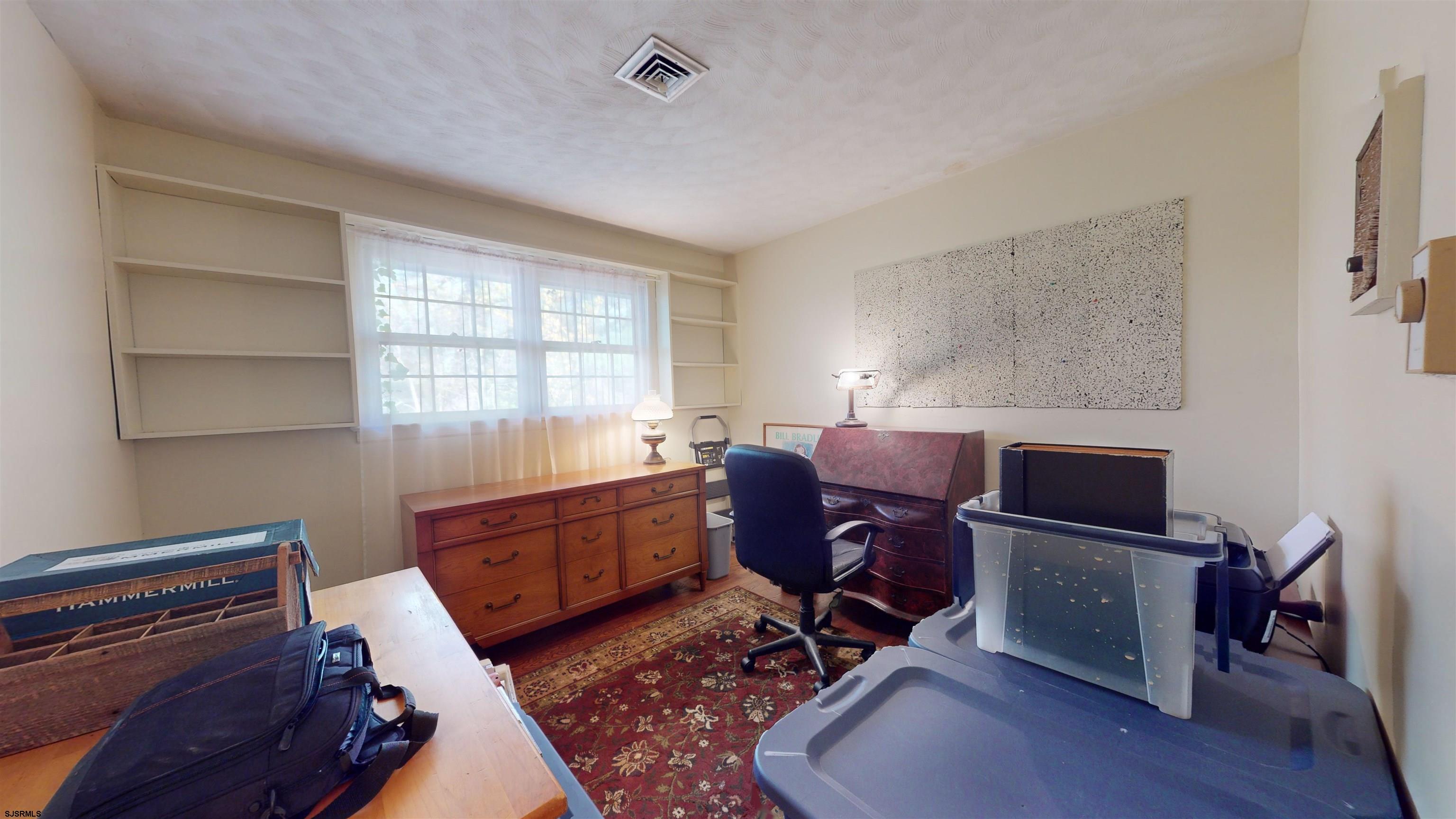 508 Lehigh Road South Glassboro, NJ 08028 - Photo 7 of 24 a room with furniture and a window