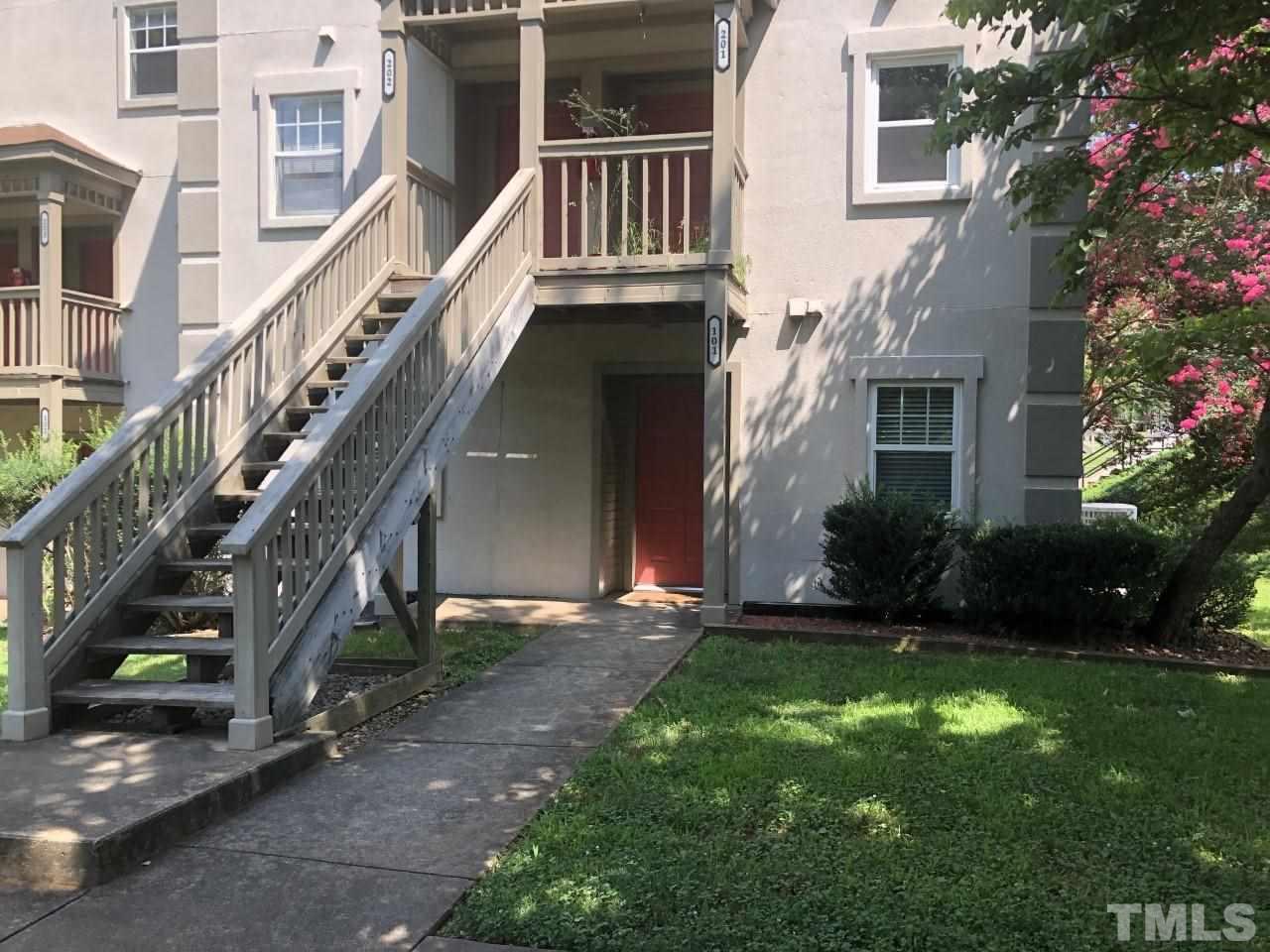 2516 Avent Ferry Road, Unit 101 Raleigh, NC 27606 - Photo 1 of 27 a view of an house with a yard