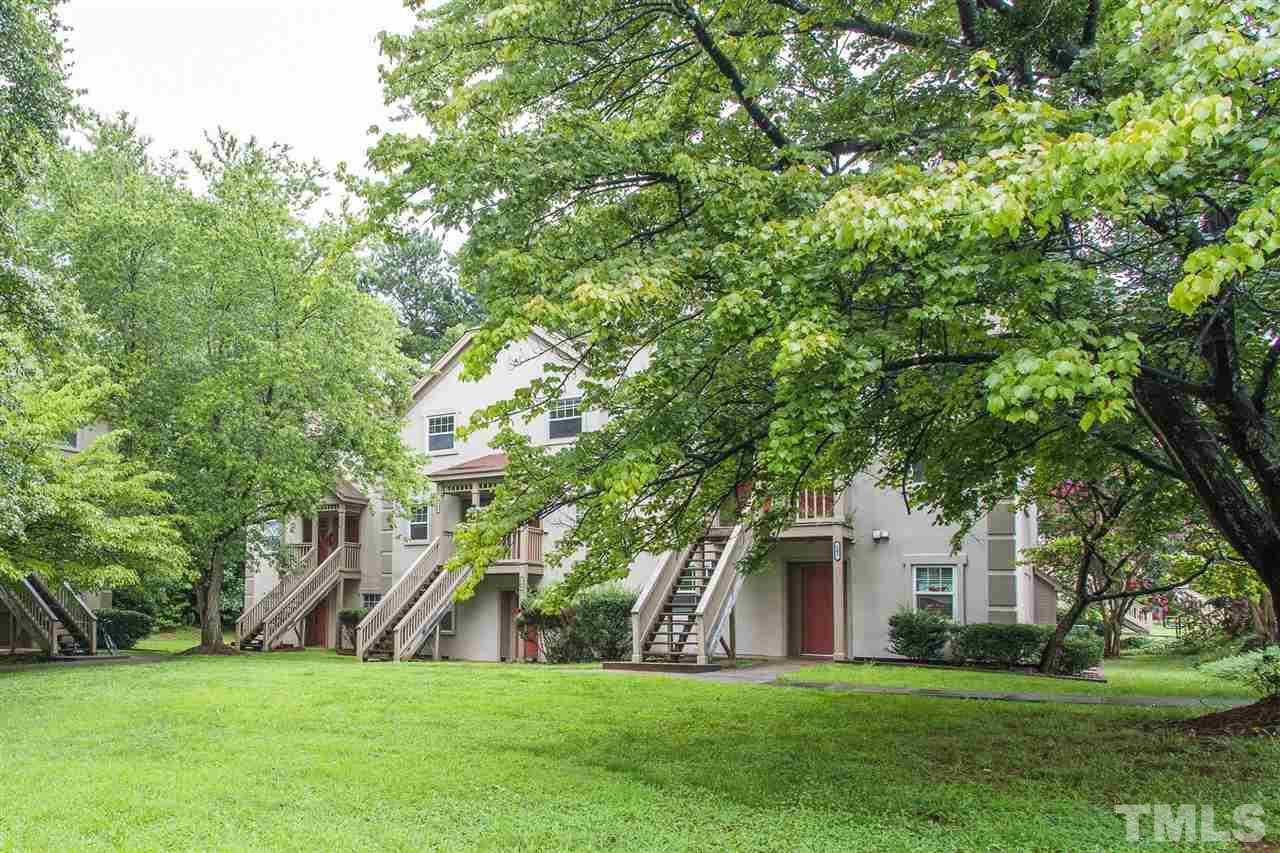 2516 Avent Ferry Road, Unit 101 Raleigh, NC 27606 - Photo 27 of 27 a view of a house with a yard