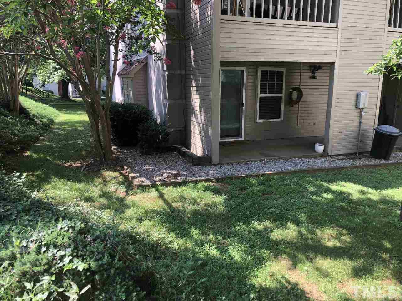 2516 Avent Ferry Road, Unit 101 Raleigh, NC 27606 - Photo 4 of 27 a view of a house with backyard