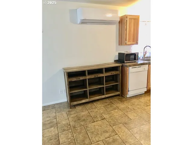 a view of cabinets with wooden floor and cabinet