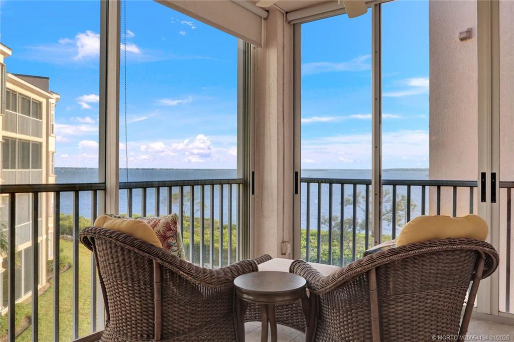 5700 Northeast Island Cove Way, Unit 4301 Stuart, FL 34996 - Photo 27 of 45 a view of a balcony with furniture