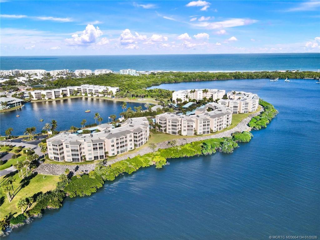 5700 Northeast Island Cove Way, Unit 4301 Stuart, FL 34996 - Photo 8 of 45 a view of a city with an ocean view