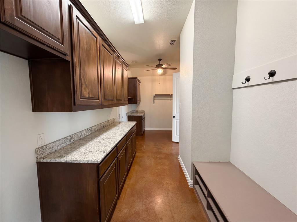 6411 Caliche Circle Midlothian, TX 76065 - Photo 13 of 26 a kitchen with a counter top space and a sink